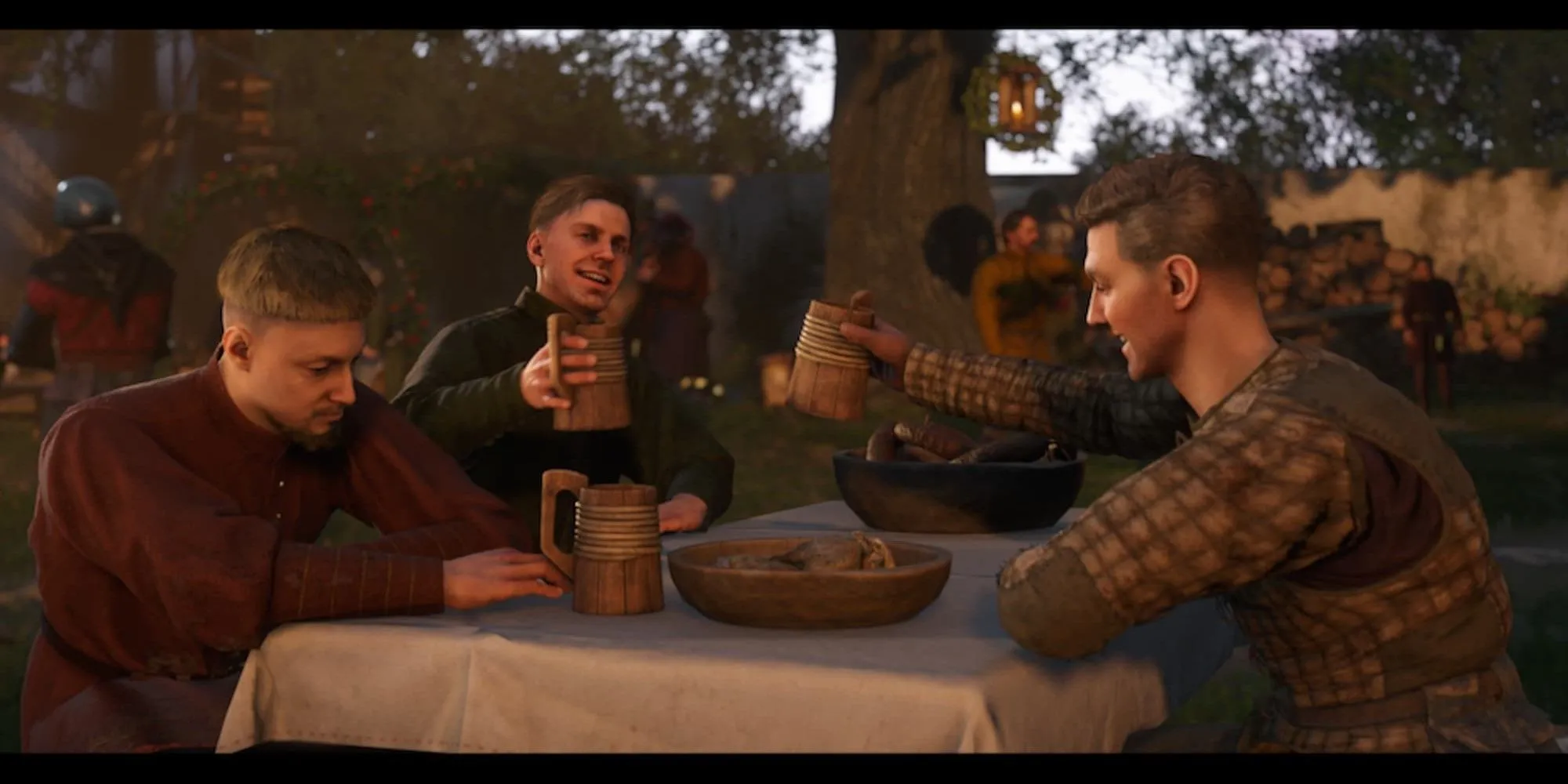 Các nhân vật đang ăn uống trong Kingdom Come Deliverance 2