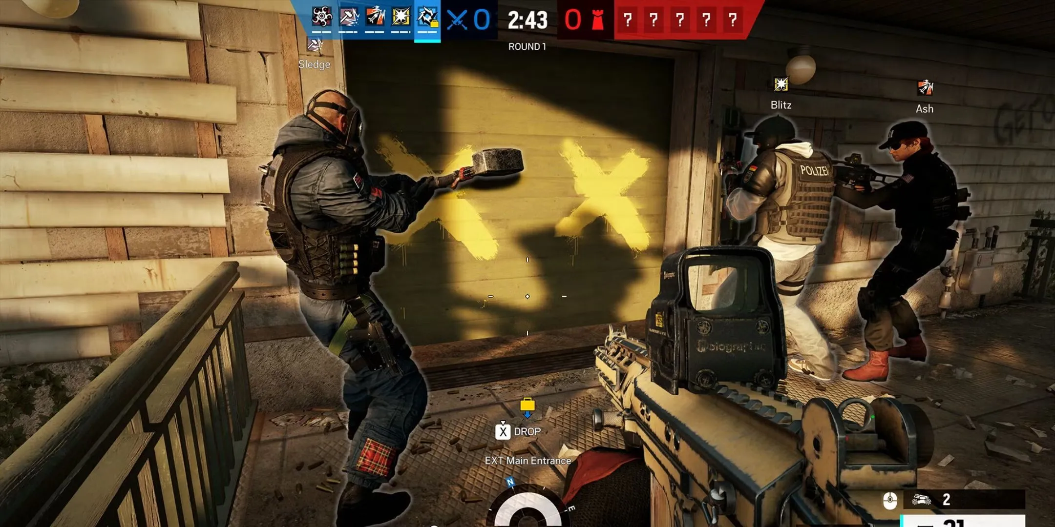 Đội đặc nhiệm Rainbow Six Siege chuẩn bị phá cửa trong một pha tấn công chiến thuật