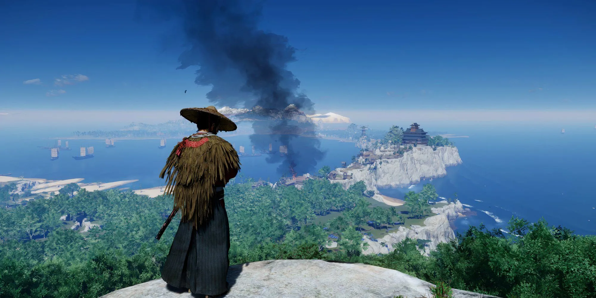 Jin Sakai trong Ghost of Tsushima đứng trên một vách đá, nhìn bao quát khung cảnh từ trên cao