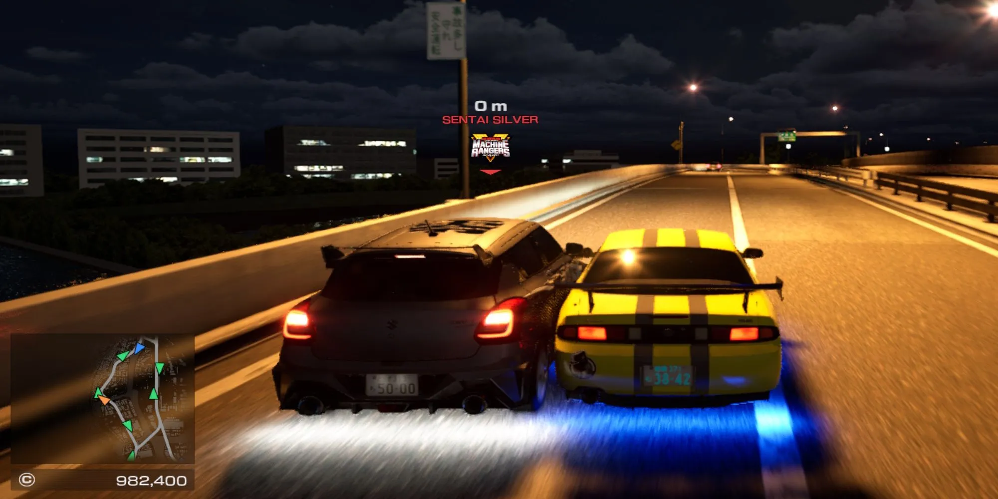Một cảnh đua đối đầu giữa hai xe trong Tokyo Xtreme Racer, minh họa việc chặn đối thủ
