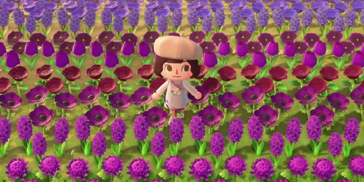 Người chơi giữa vườn hoa trong Animal Crossing: New Horizons, game mô phỏng thư giãn với camera cố định góc nhìn từ trên xuống