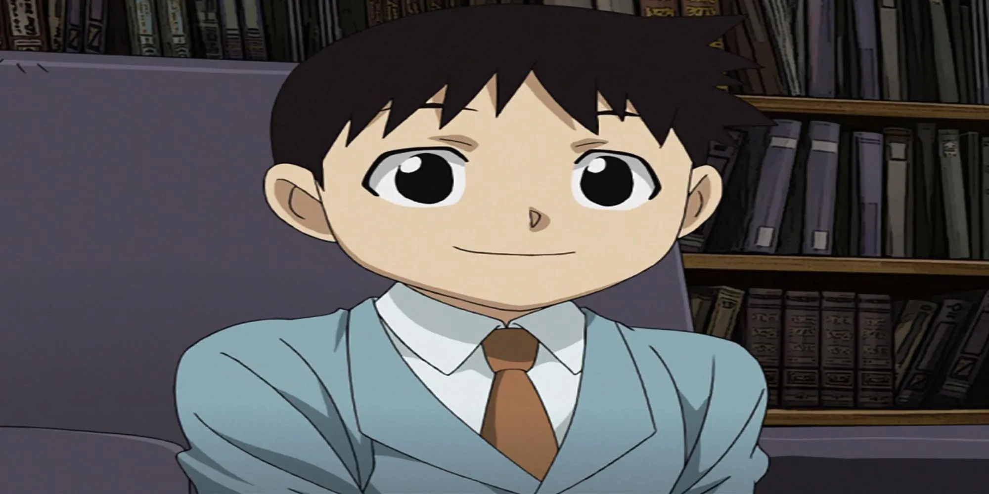 Selim Bradley mỉm cười, thực chất là Homunculus Pride trong Fullmetal Alchemist Brotherhood