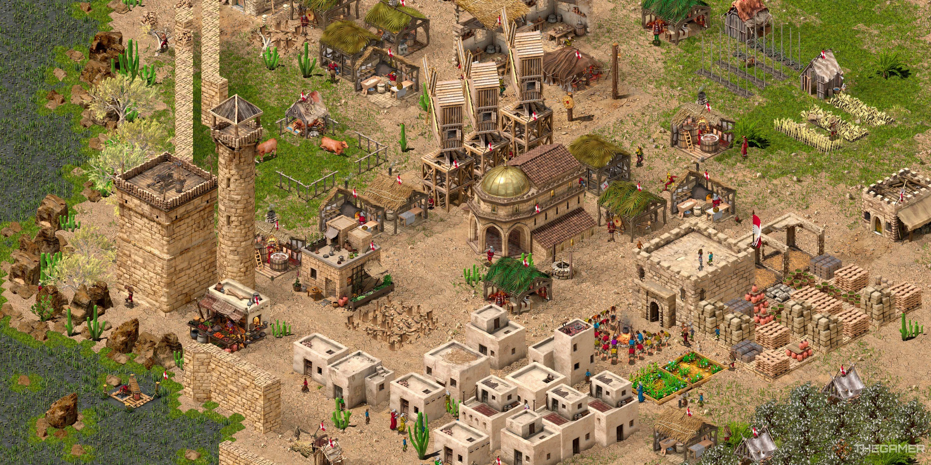 Tổng quan một căn cứ khởi đầu trong Stronghold Crusader Definitive Edition với công trình và quân đội.