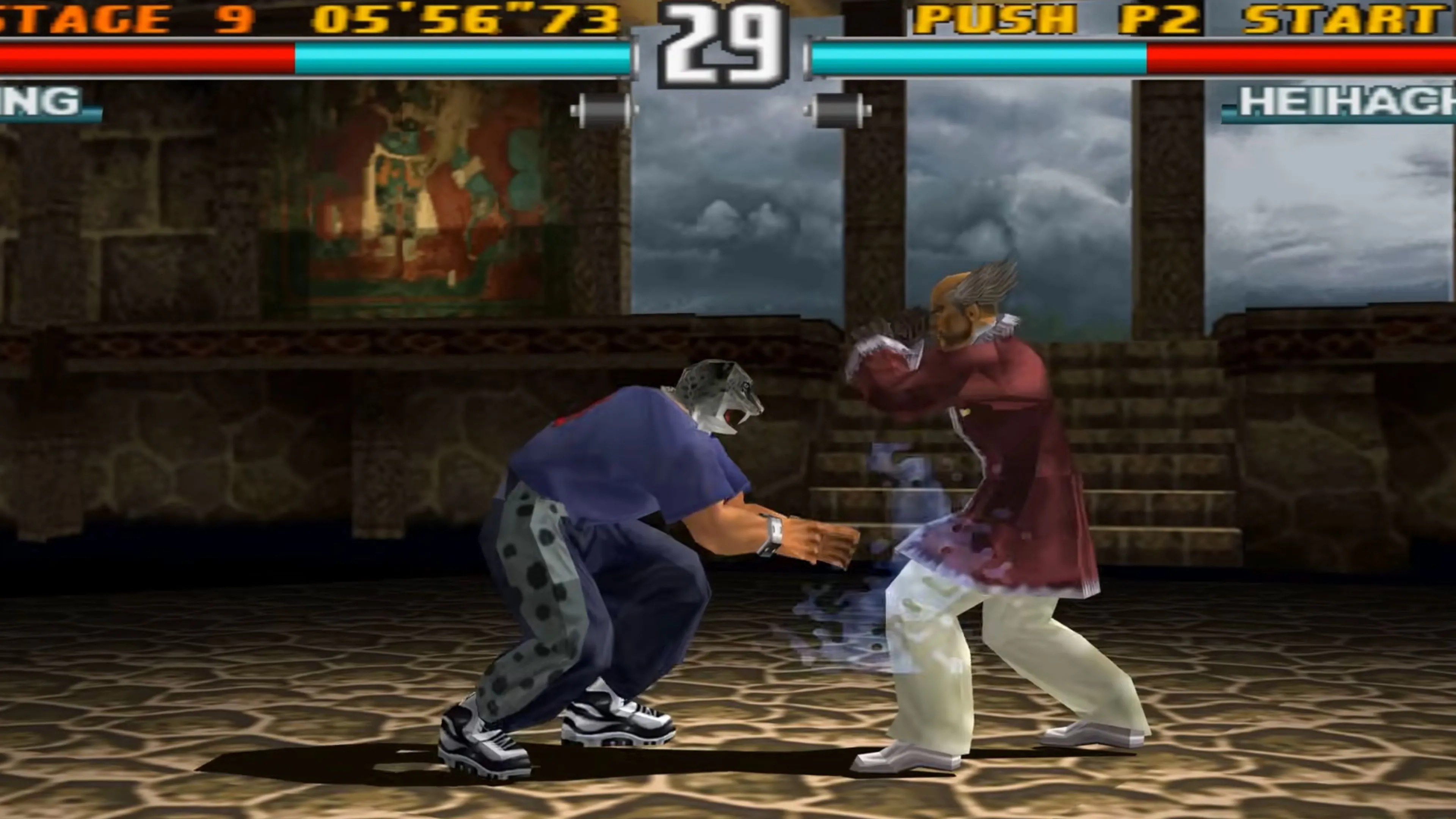 Hình ảnh trận đấu King vs Heihachi trong Tekken 3, khung cảnh đấu trường cổ điển PS1