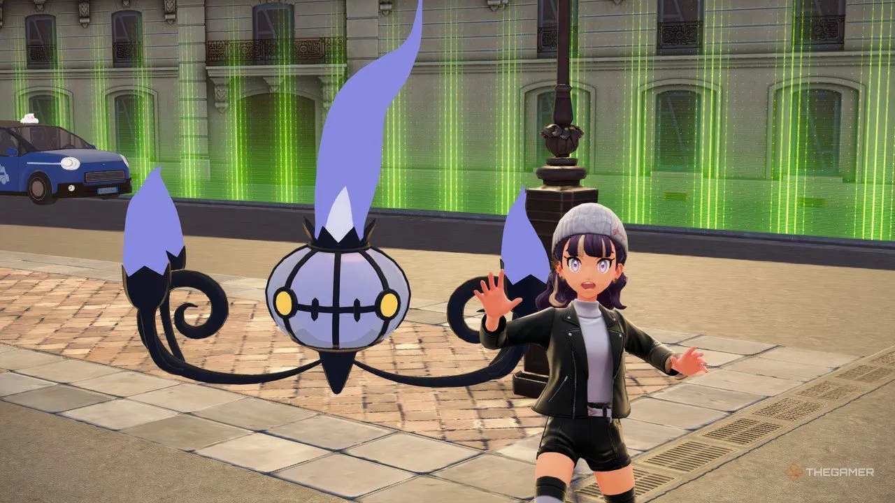 Người chơi đứng cạnh Chandelure — hình minh hoạ TM Fire trong Pokemon Legends: Z-A