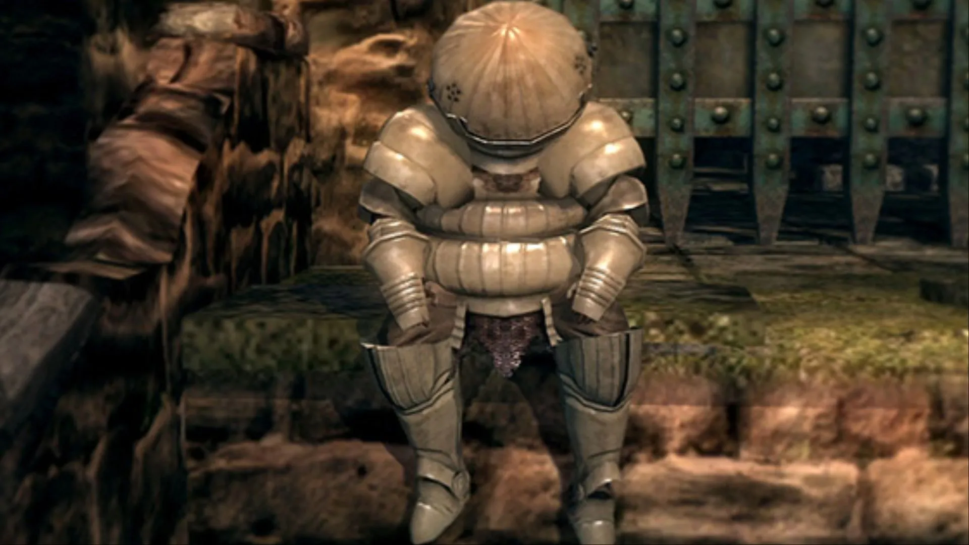 Siegmeyer of Catarina nghỉ ngơi trước cổng trong Dark Souls, NPC dễ bị dẫn tới cái chết